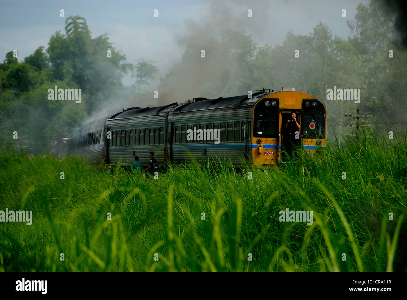Crashed train waiting for emergency services to arrive on 14/06/2011 in Phitsanulok Thailand Stock Photo