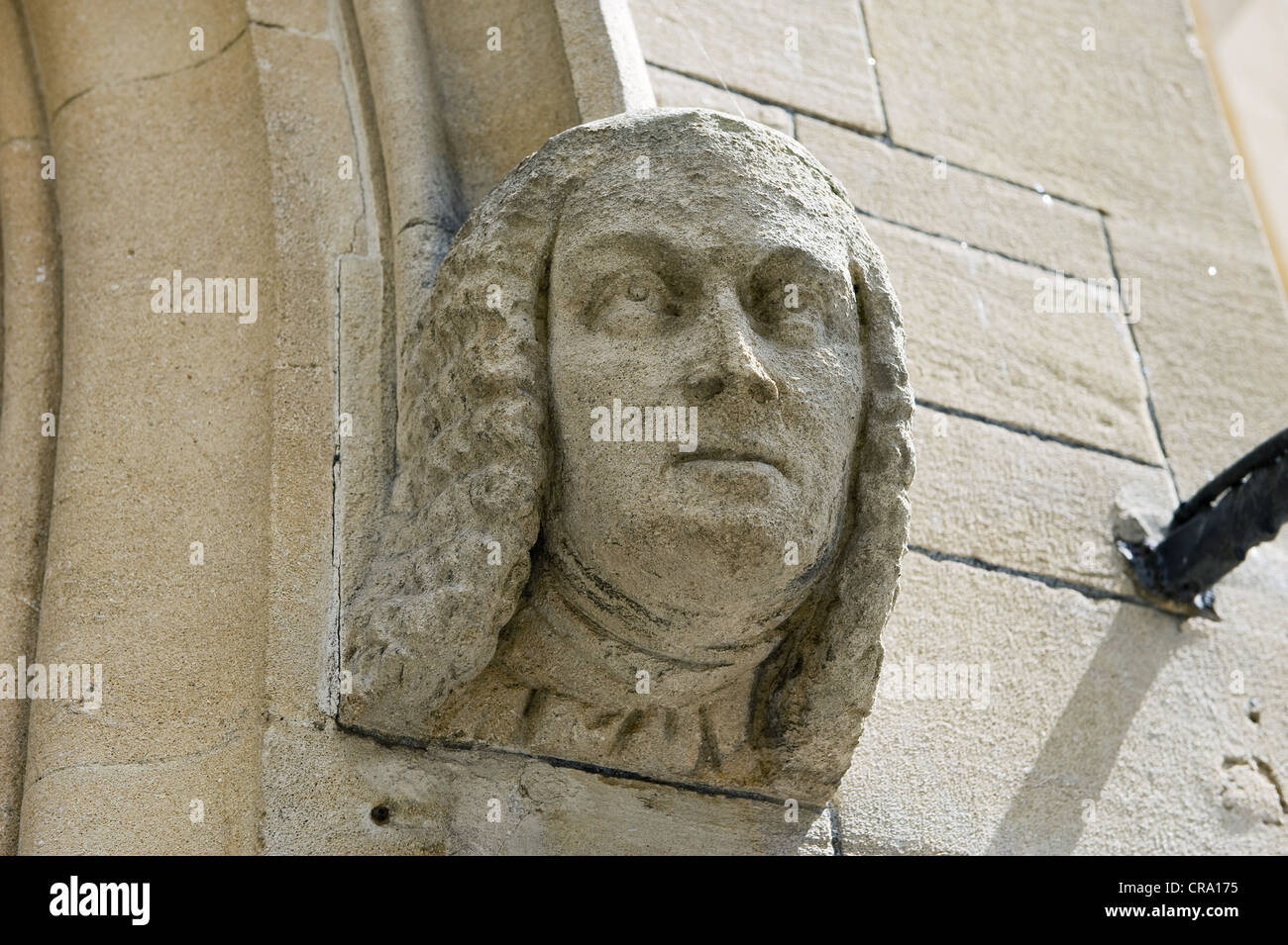 A stone carving of a barrister/judge Stock Photo
