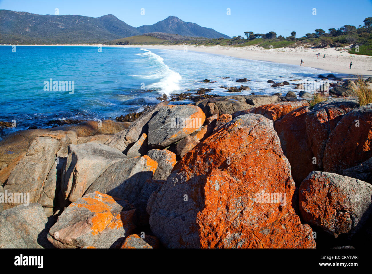 View along Wineglass Bay with Mt Graham and Mt Freycinet beyond Stock Photo