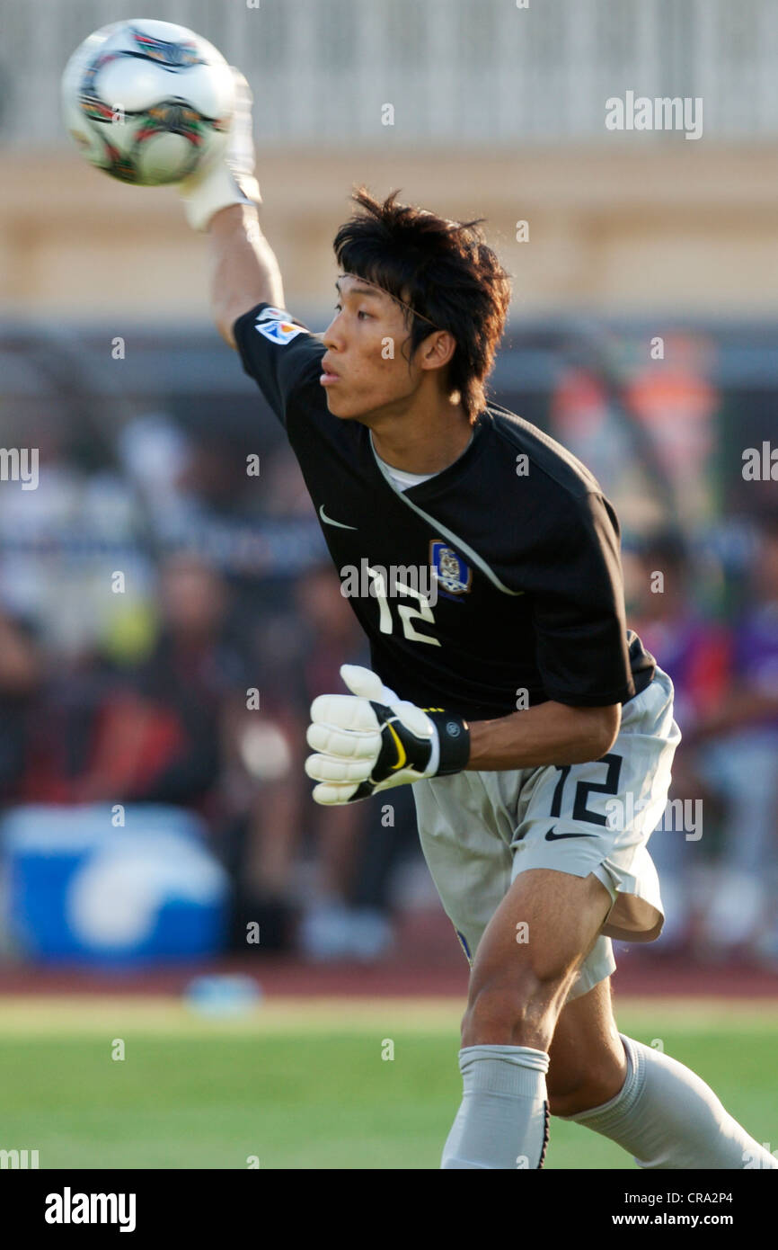 Goalkeeper Seung Gyu Kim of South Korea throws the ball during a 2009 FIFA U-20 World Cup Group C match against Germany. Stock Photo