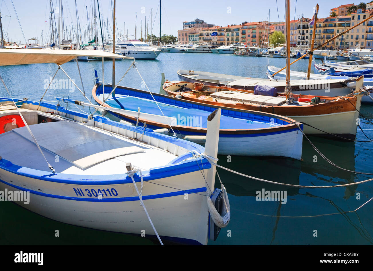 Fishing boats tied up at Cannes harbour, Cote d'Azur, France Stock
