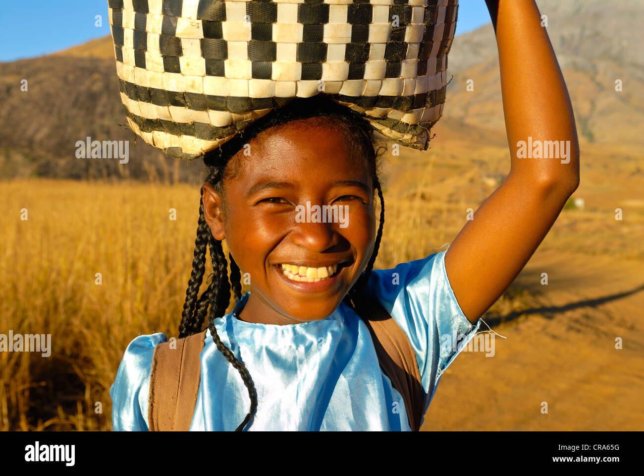Girl carrying basket on head hires stock photography and images Alamy