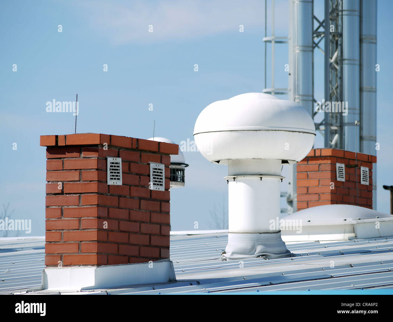 Plant roof with various outlets and chimneys Stock Photo