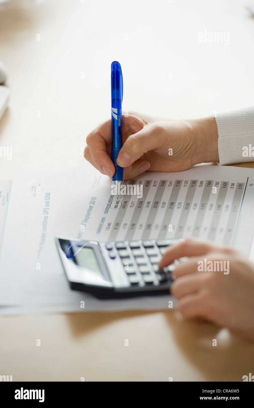 Calculation, calculator, detail, hands Stock Photo
