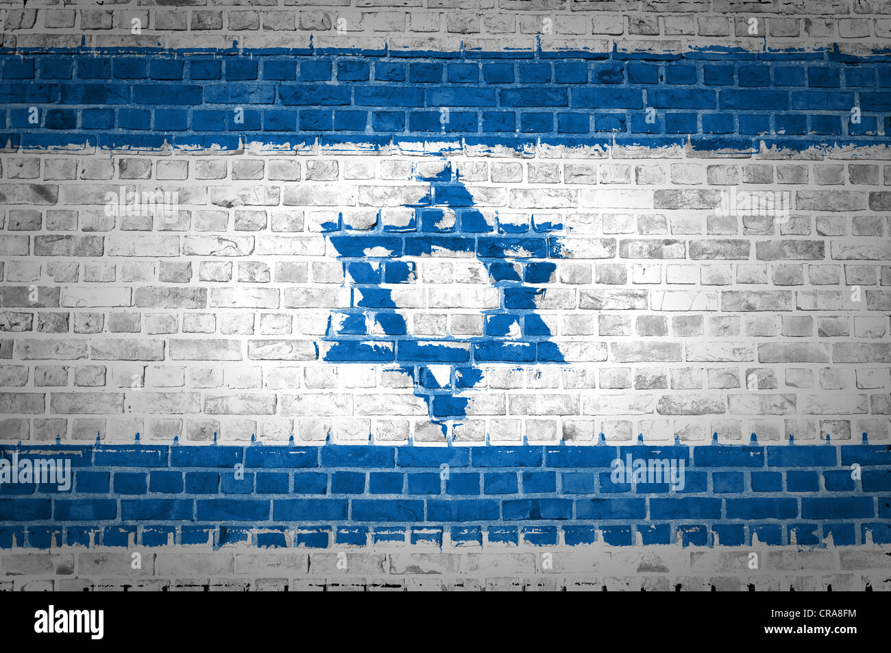 An image of the Israel flag painted on a brick wall in an urban location Stock Photo