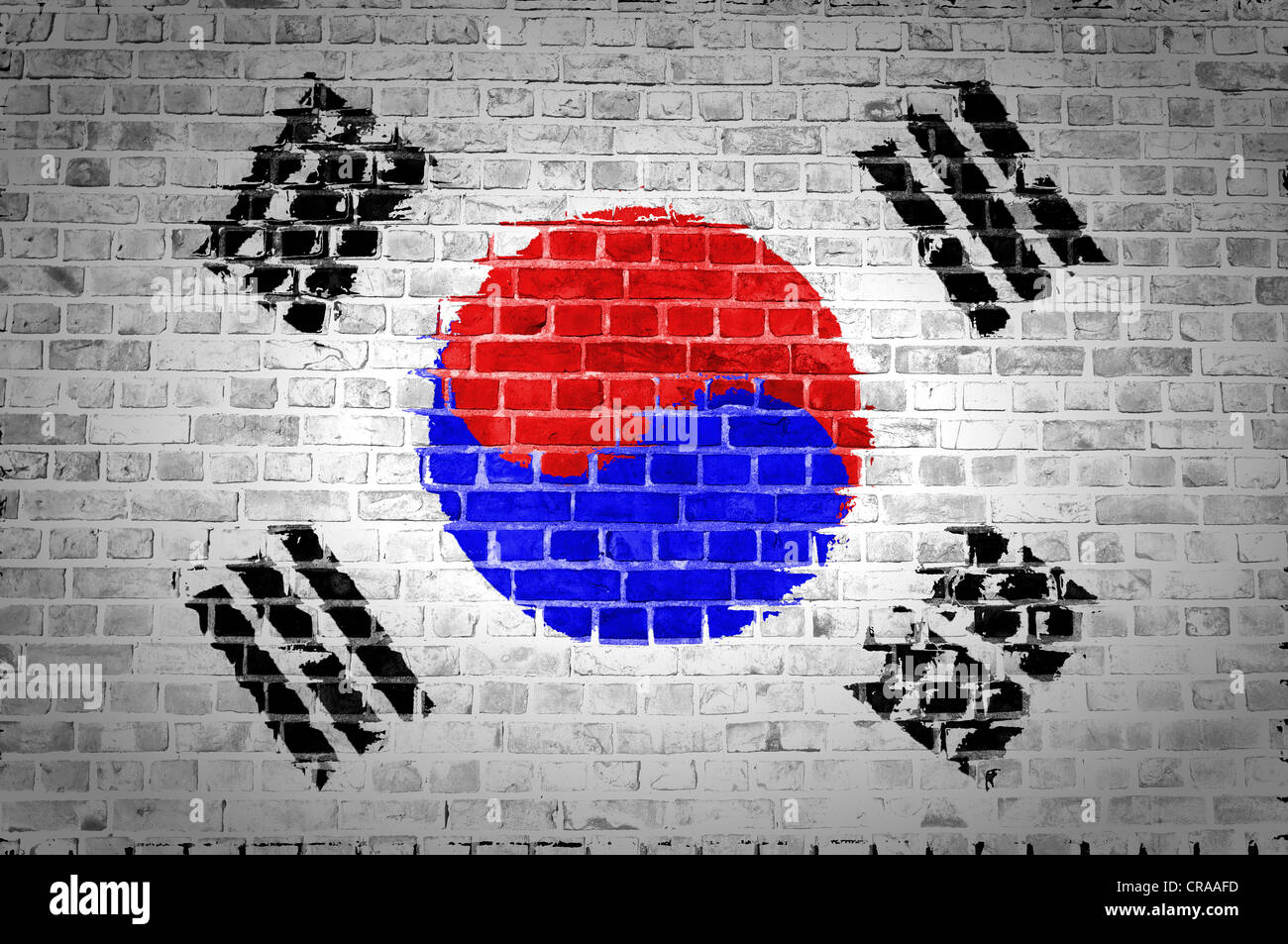 An image of the South Korea flag painted on a brick wall in an urban location Stock Photo