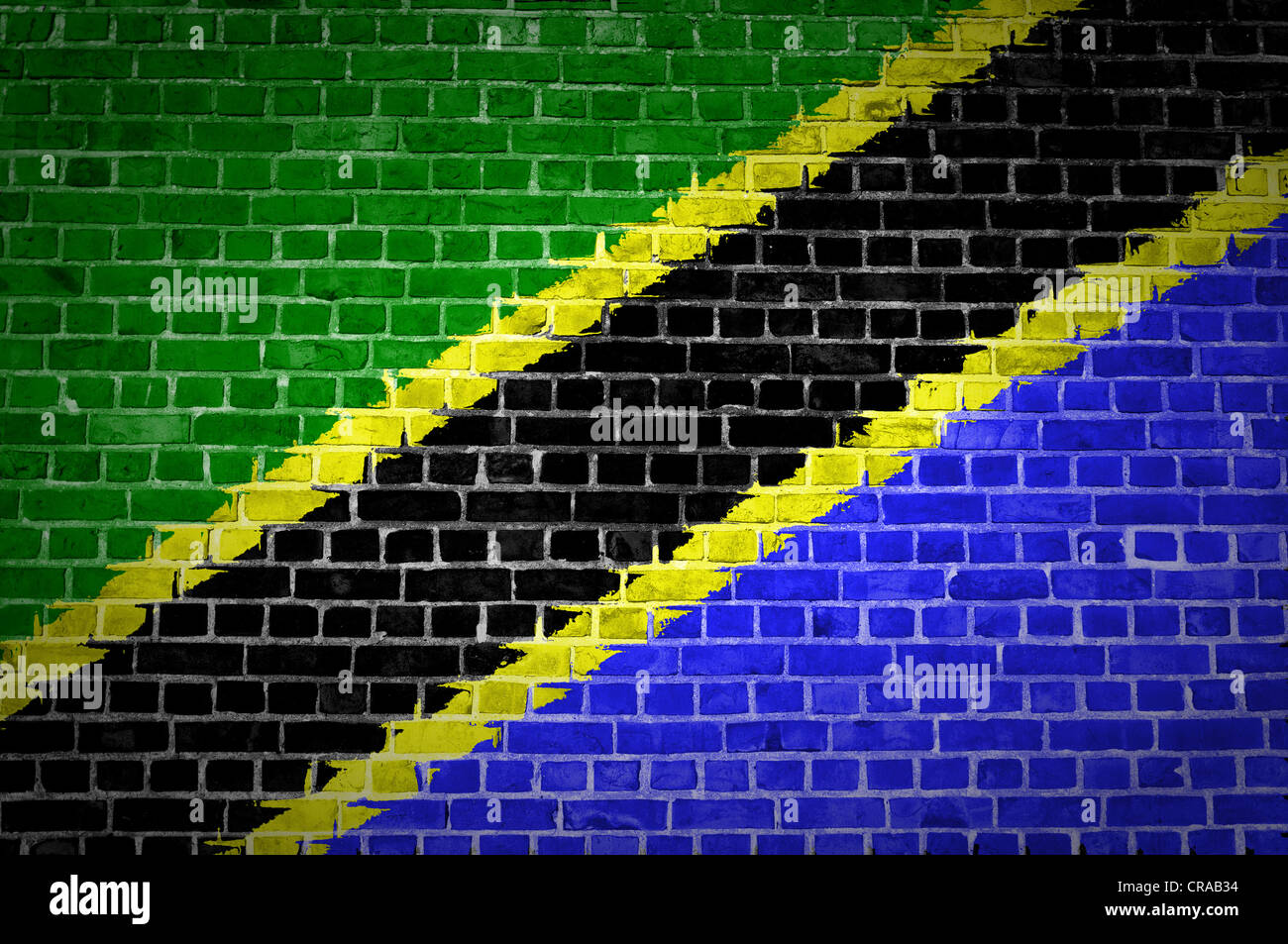 An image of the Tanzania flag painted on a brick wall in an urban location Stock Photo