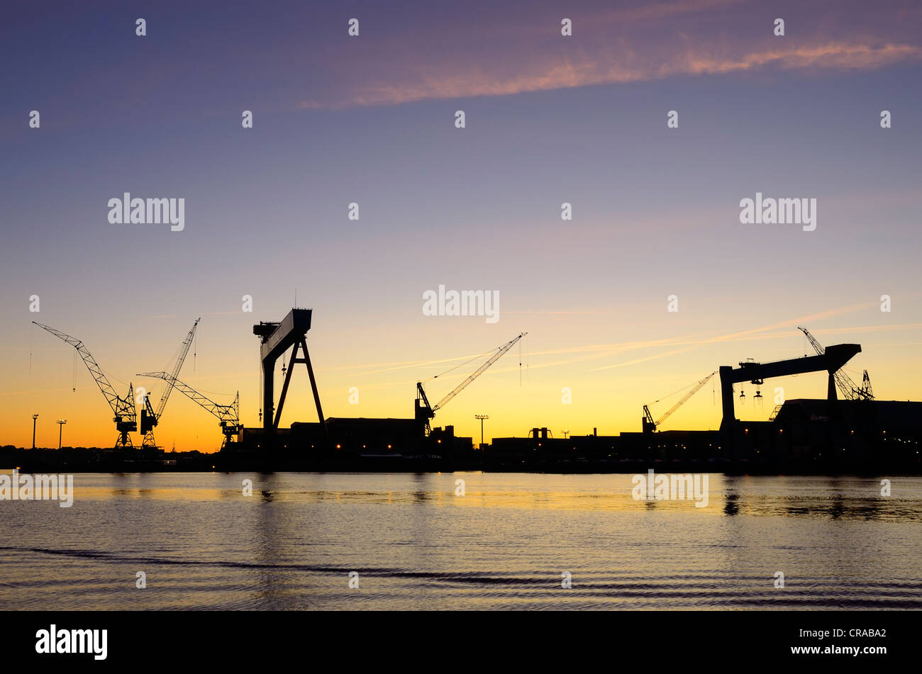 Cranes of the HDW shipyard, Howaldtswerke-Deutsche Werft GmbH, in cooperation with Thyssen-Krupp Marine Systems AG, morning mood Stock Photo