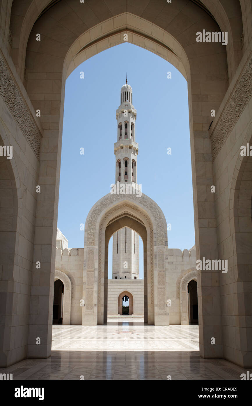 Square with pointed arch, gate, minaret, Sultan Qaboos Grand Mosque, Muscat capital, Sultanate of Oman, gulf states Stock Photo