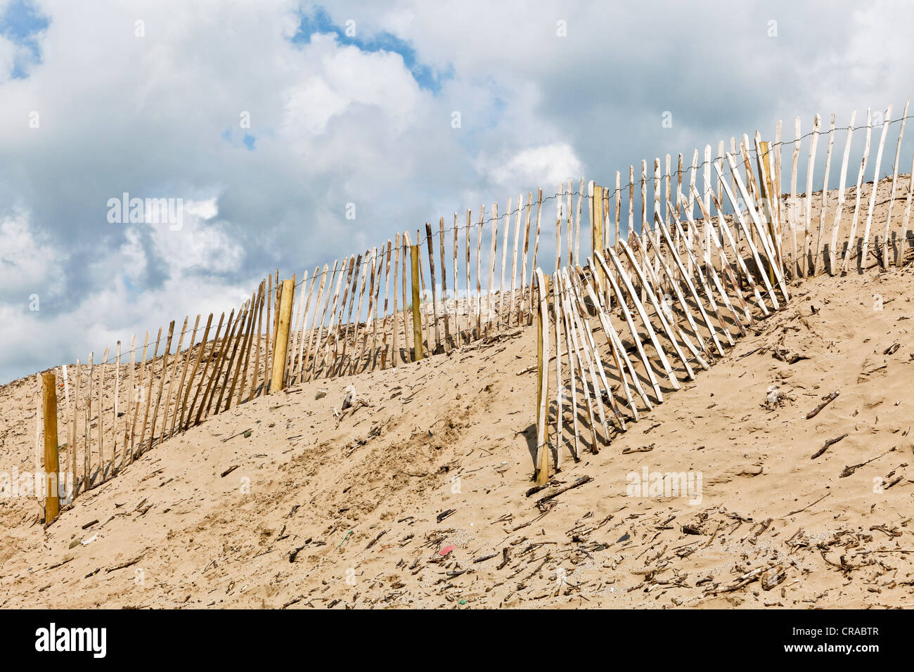 Wooden railings used to protect sand dunes from erosion Stock Photo - Alamy