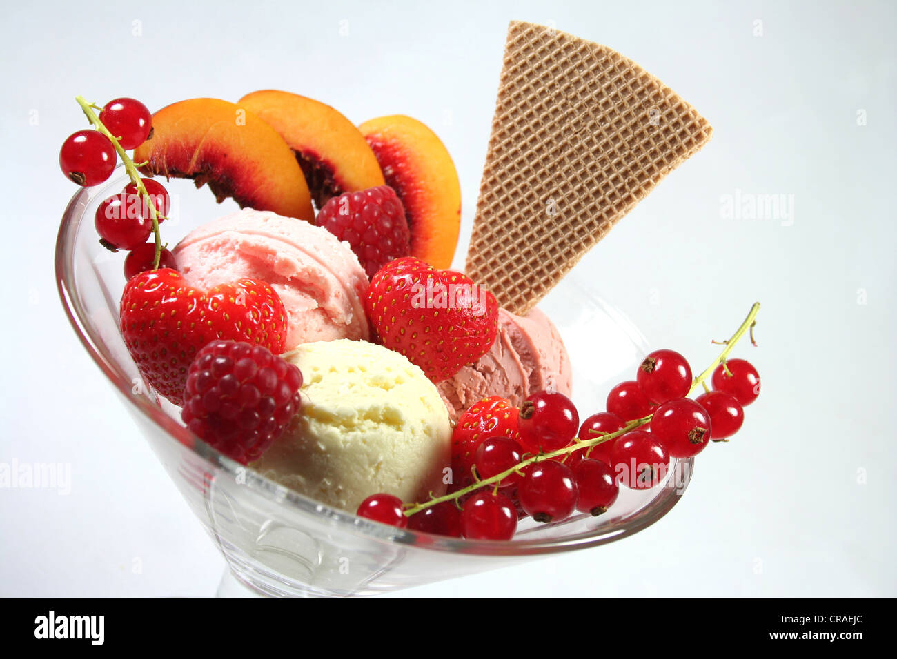 Ice cream with fruit and waffle Stock Photo - Alamy