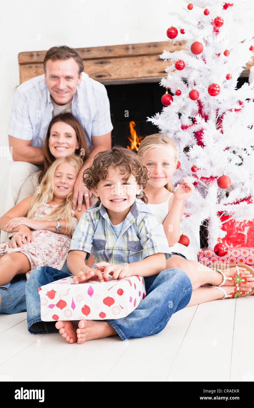 Family opening Christmas gifts Stock Photo