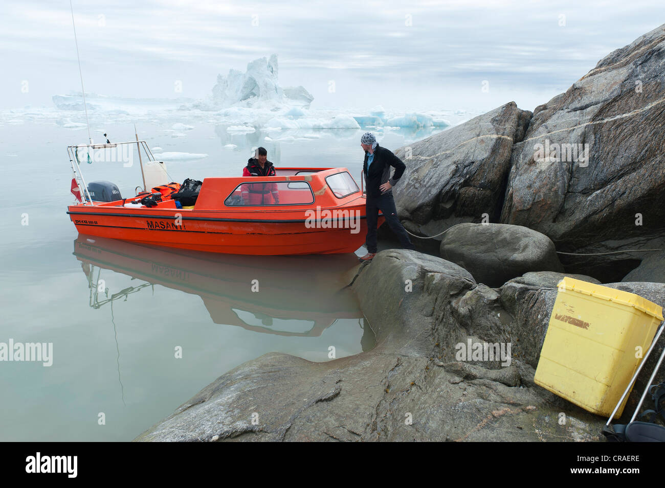 Motorboat, icebergs, arrival in Johan Petersen Fjord, East Greenland, Greenland Stock Photo