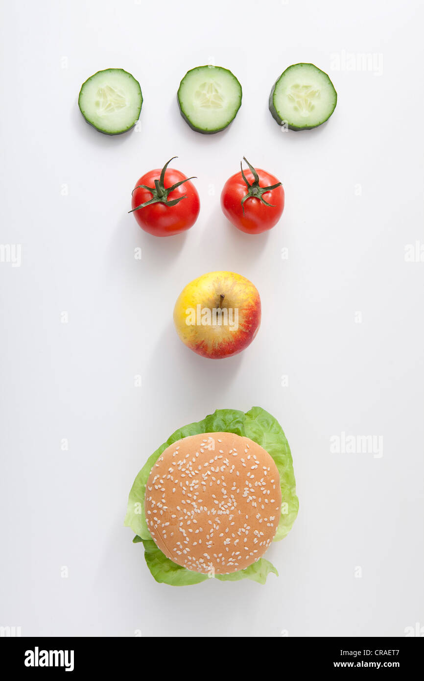 Fruit, vegetables and burger, fast food Stock Photo Alamy