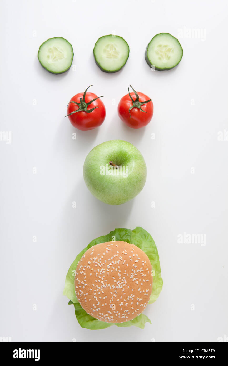 Fruit, vegetables and burger, fast food Stock Photo Alamy