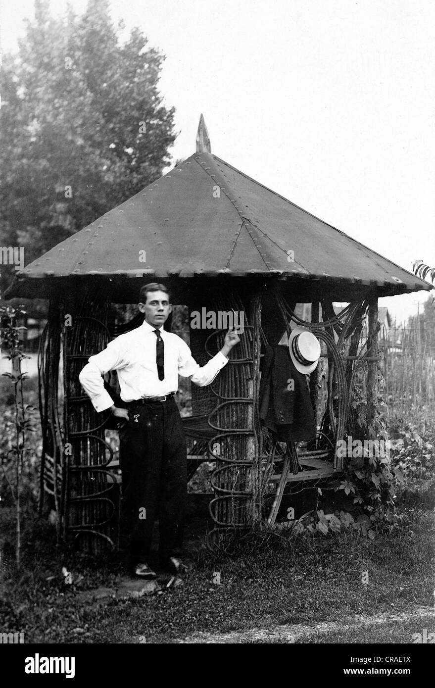 Young Man at Rustic Victorian Gazebo Stock Photo