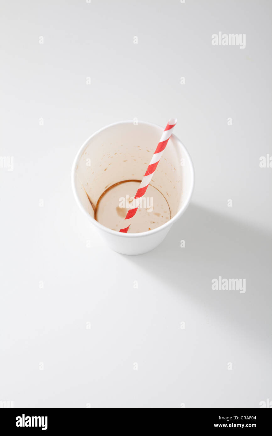 Empty paper cup with a straw Stock Photo