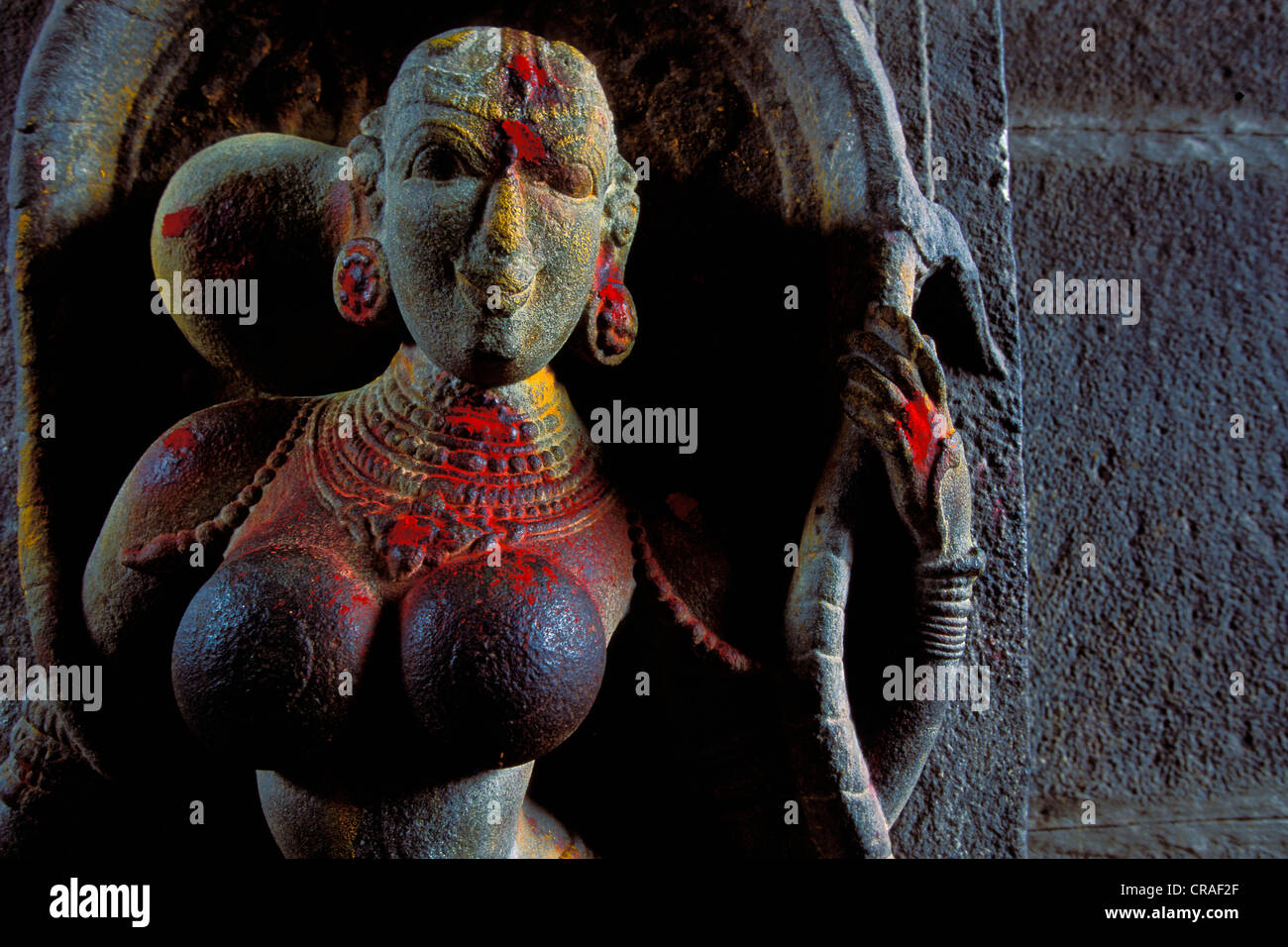 Women's sculpture decorated with kumkum powder, entrance of Minakshi, Meenakshi or Sri-Minakshi-Sundareshwara Temple, Madurai Stock Photo