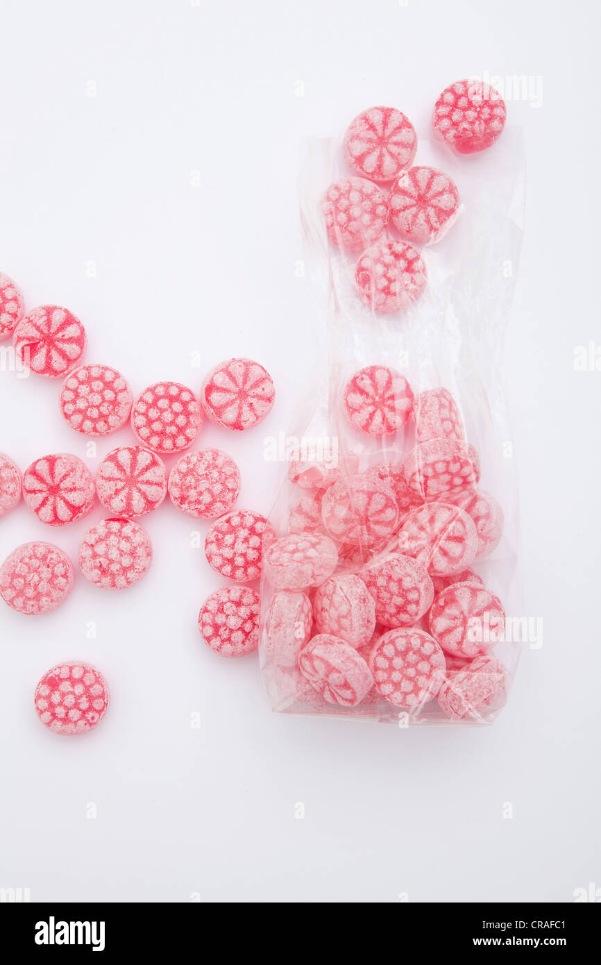 Raspberry candies from the bag Stock Photo