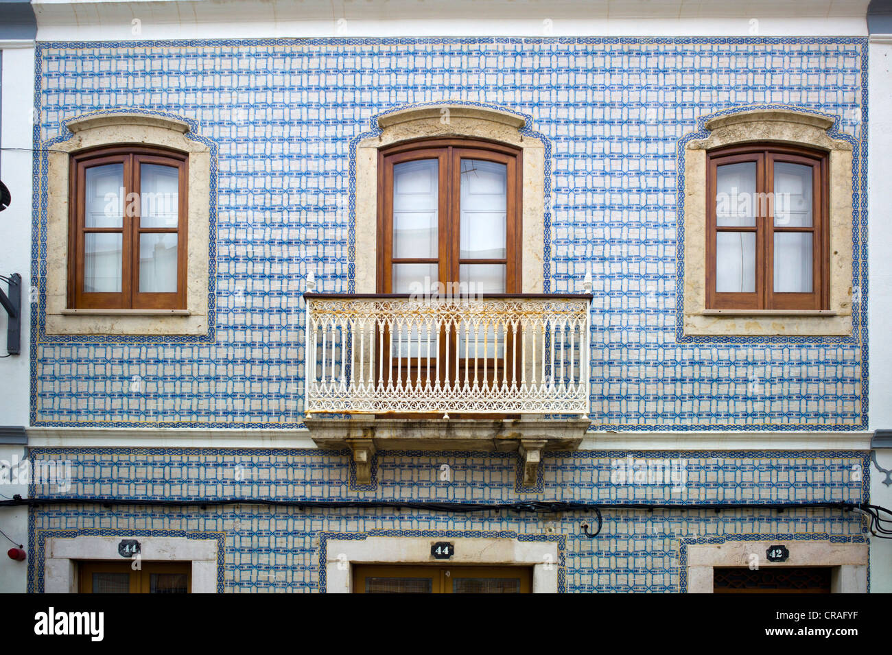 Typical, painted Azulejo ceramic tiles on a house facade, Lagos, Algarve, Portugal, Europe Stock Photo