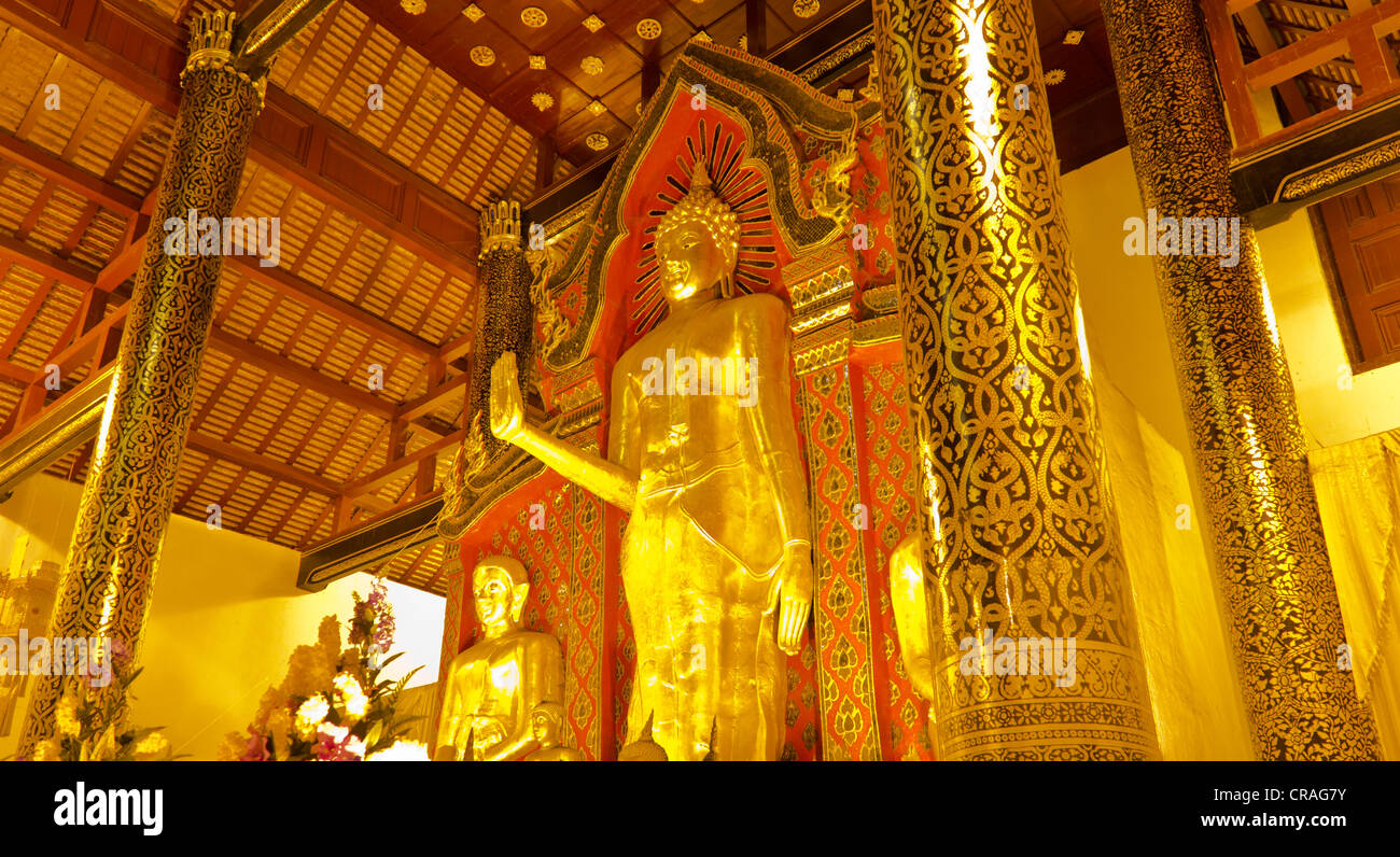 Standing Buddha image at Wat Thai in Chiangmai. Stock Photo