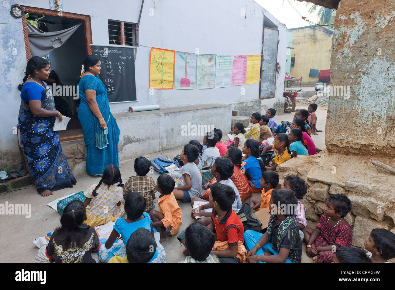 Teachers and pupils, night school, Sevandhipalayam near Karur, Tamil Nadu, South India, Asia Stock Photo