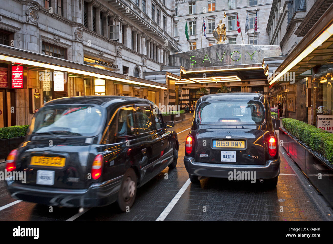 Black cabs, Savoy Hotel, London, England, United Kingdom, Europe Stock Photo