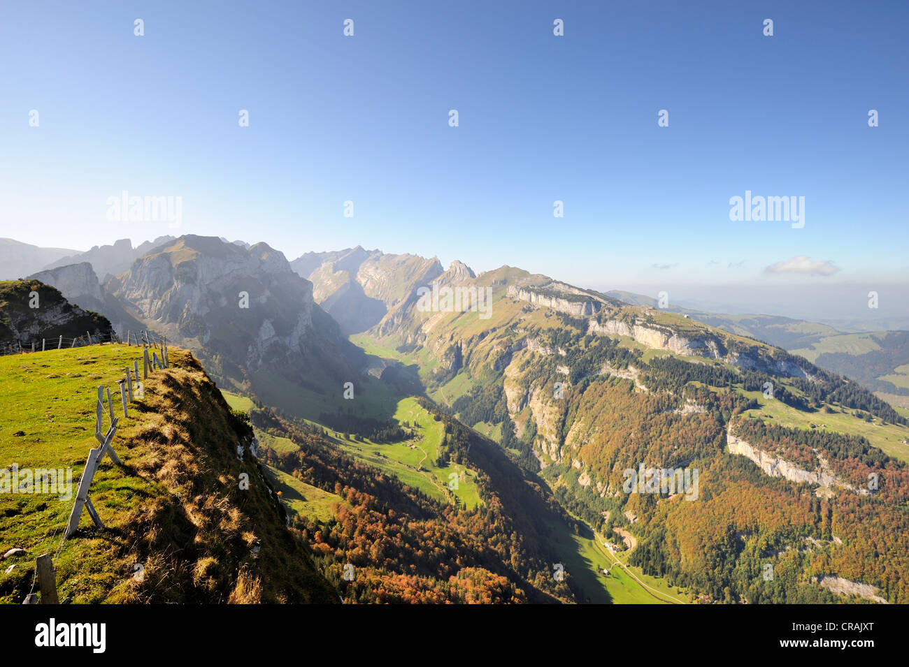 View down from the high plateau Alp Sigel, 1730 m, towards Wasserauen in the Appenzell Alps, with Ebenalp Mountain on the right Stock Photo