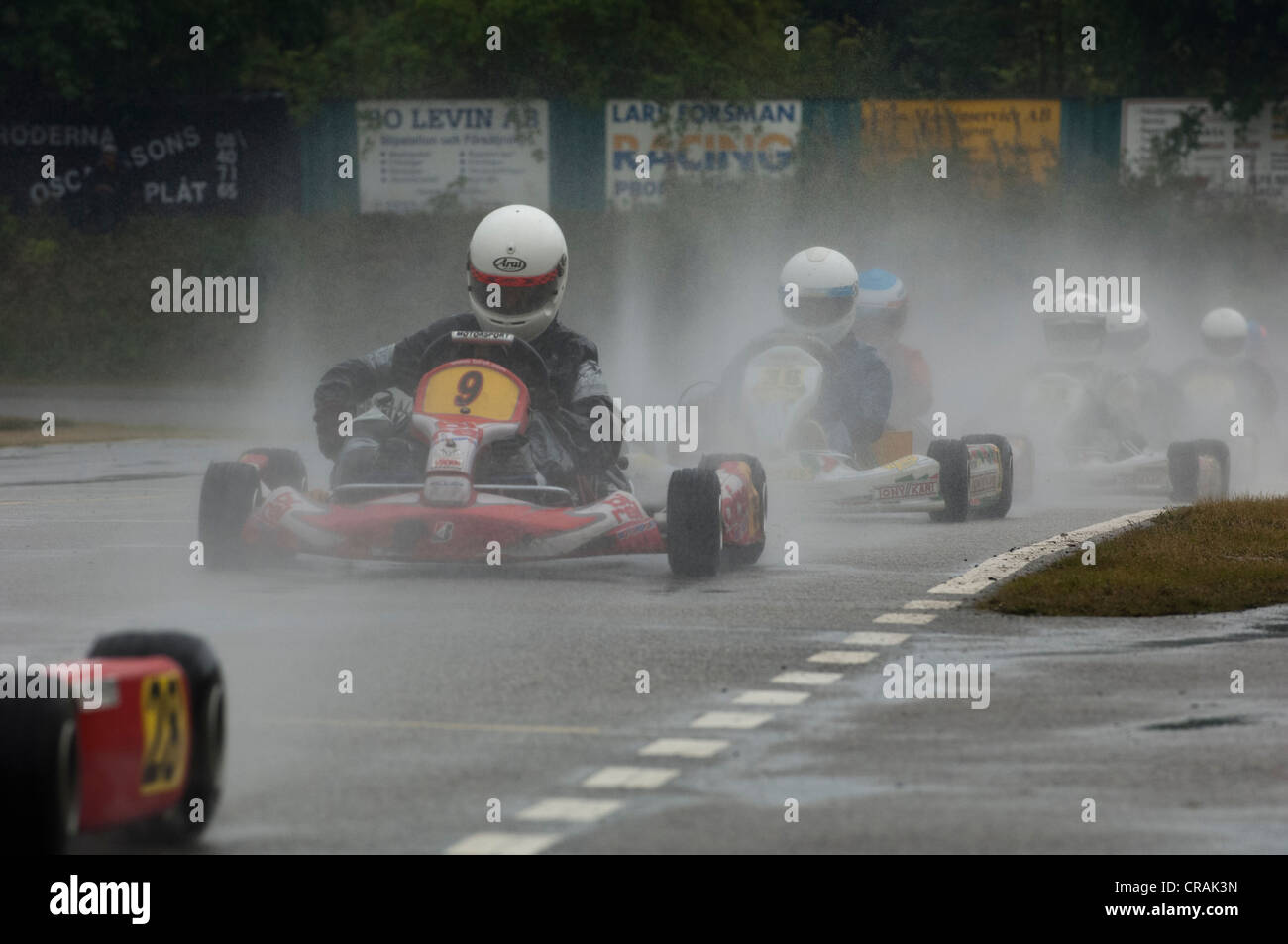 Gokart race in rain Stock Photo Alamy