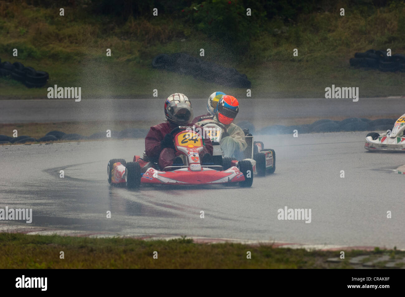 Gokart race in rain Stock Photo Alamy