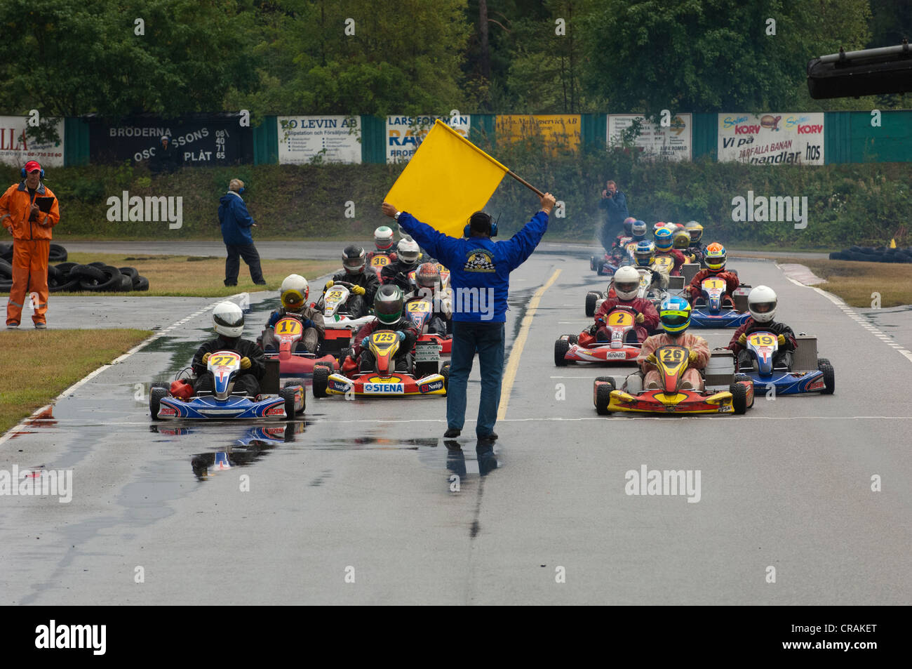 Gokart race in rain Stock Photo Alamy