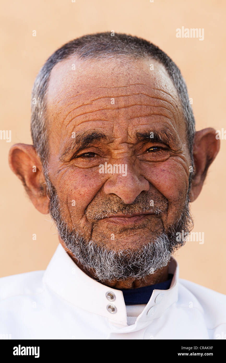 Portrait of a the owner of part of an oasis where Damask Roses (Rosa damascena) are organically grown, Valley of Roses Stock Photo