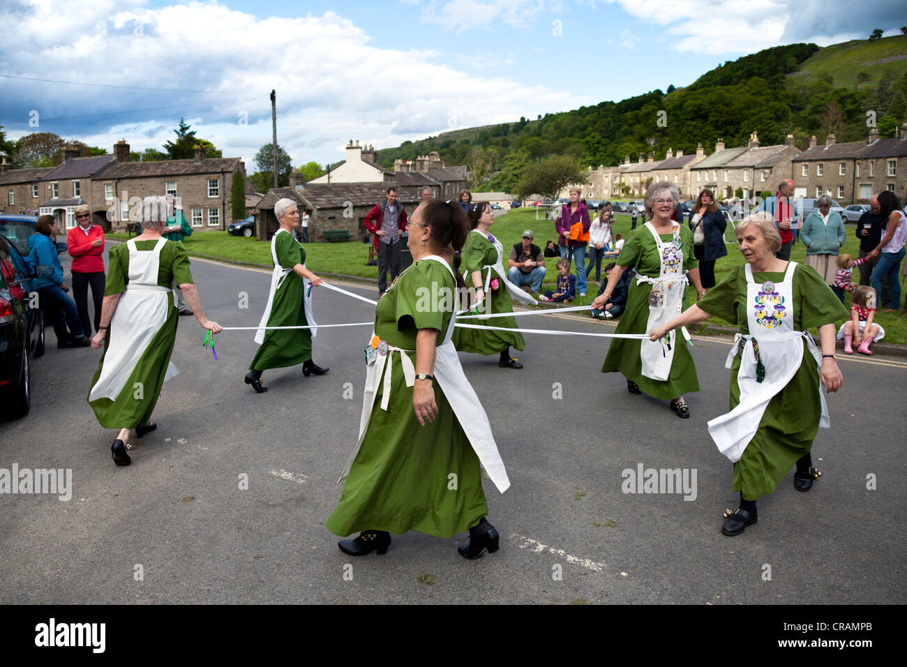 Open Morris_ Ladies Morris Dancing, in the village of West Burton, Wensleydale, North Yorkshire, UK Stock Photo