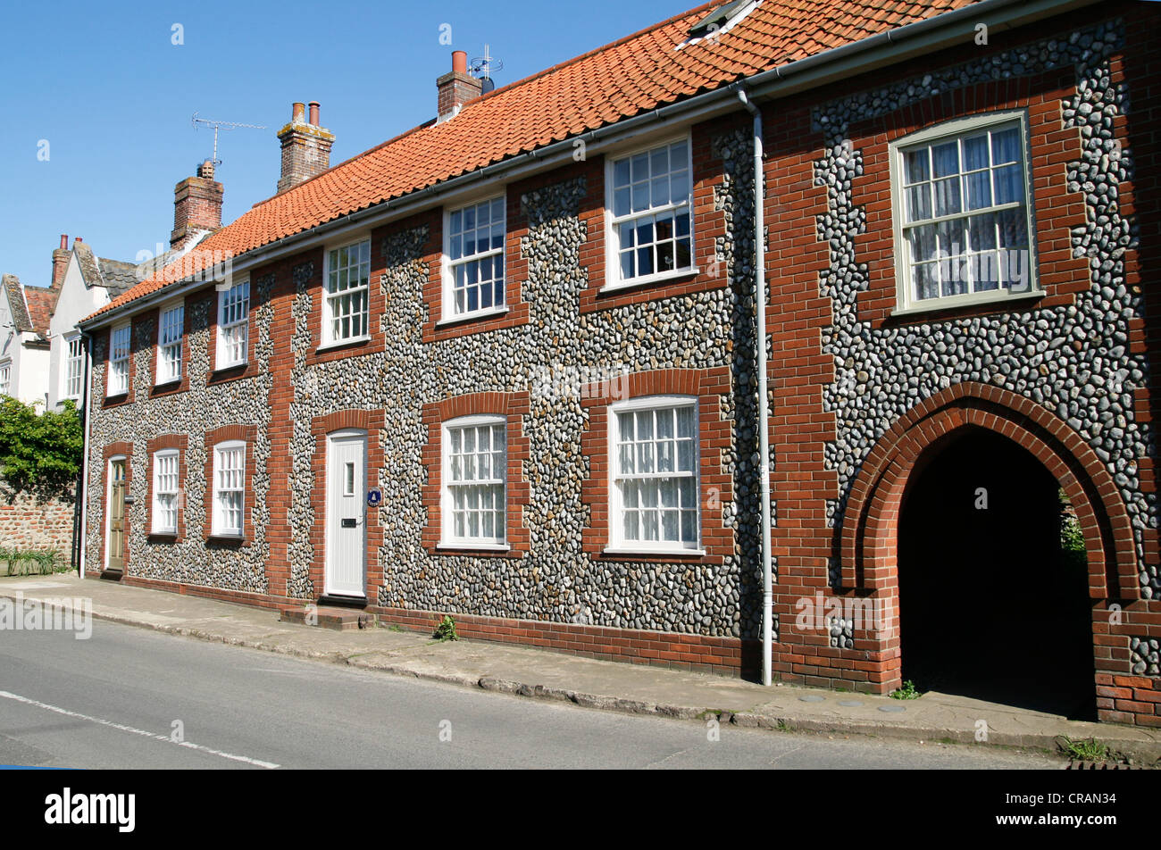 Flint and brick cottages Cley next the Sea Norfolk England UK Stock