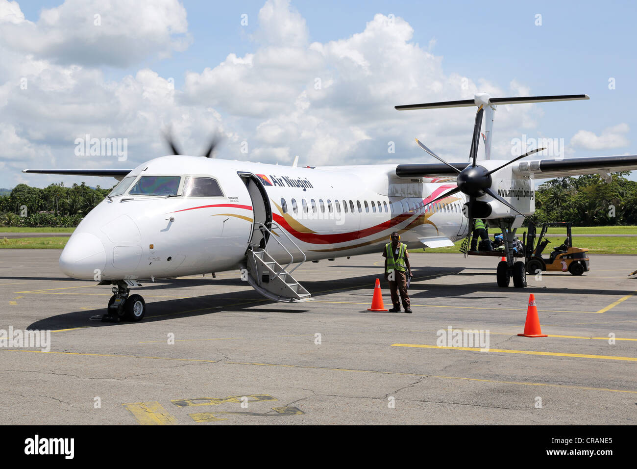 Bombardier Q400 Next Gen. of Air Niugini at Madang Airport, Papua New Guinea Stock Photo
