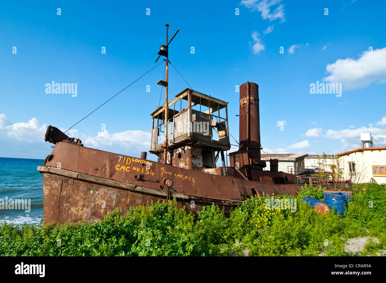 Old rusty steam boat, Turkish part of Cyprus Stock Photo