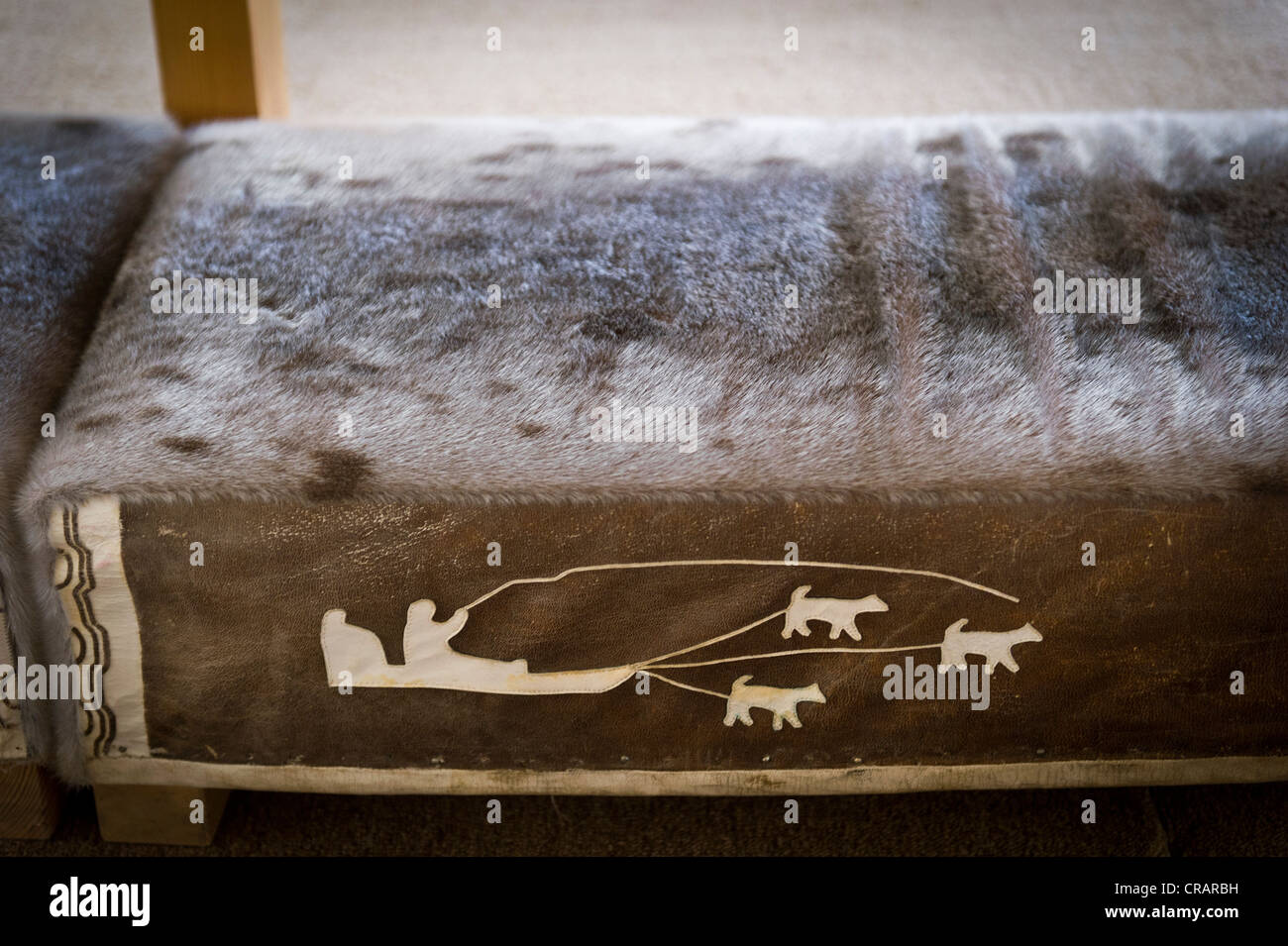 Dog sled, with decorated seal skin, in the new church of Tasiilaq or Ammassalik, East Greenland, Greenland Stock Photo