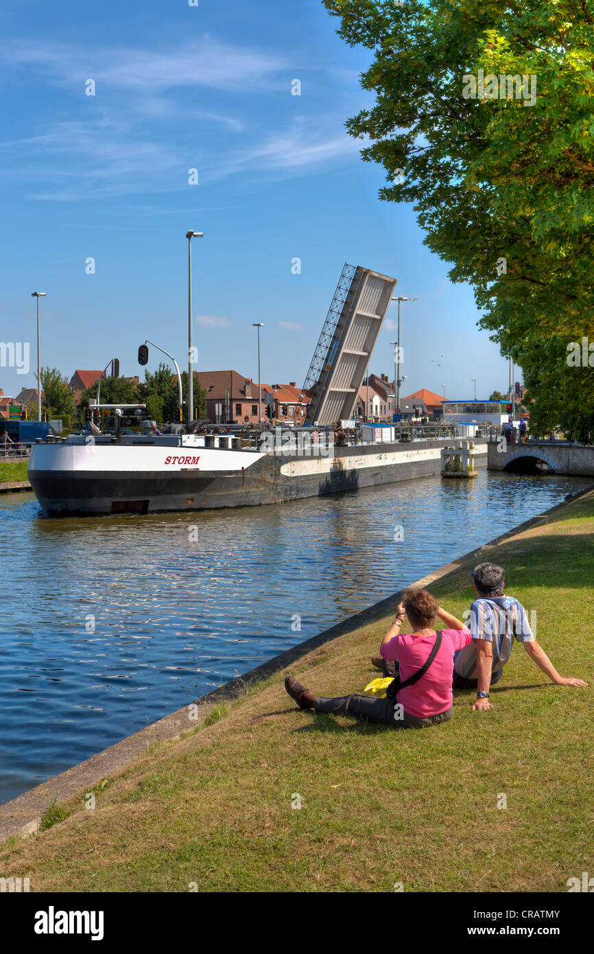 Cargo shipping passing a movable bridge, Vlaanderen Fietsroute