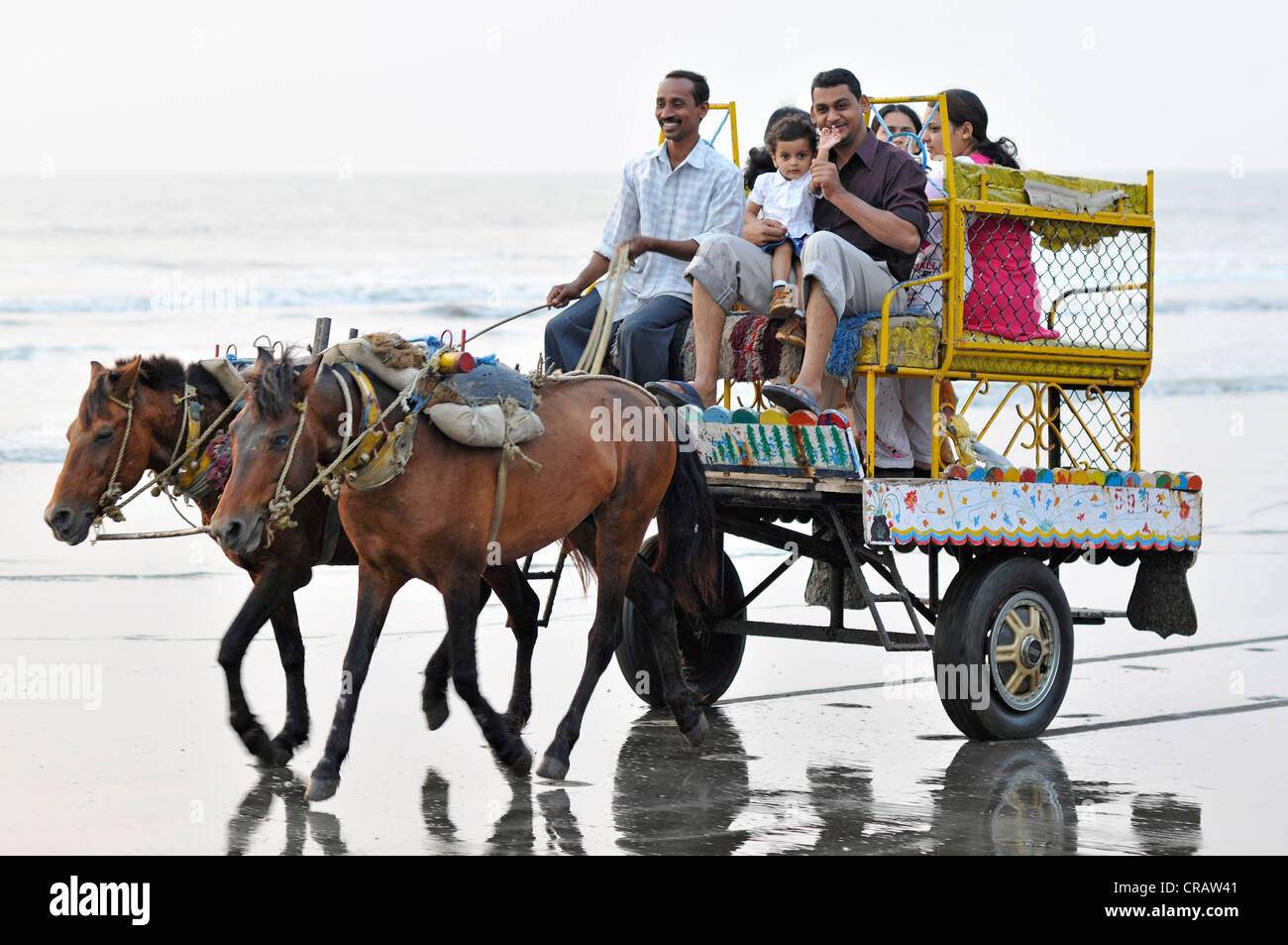 Indian family on a horse cart on the beach at Juhu, Juhu Beach, Mumbai, Maharashtra, India, Asia Stock Photo