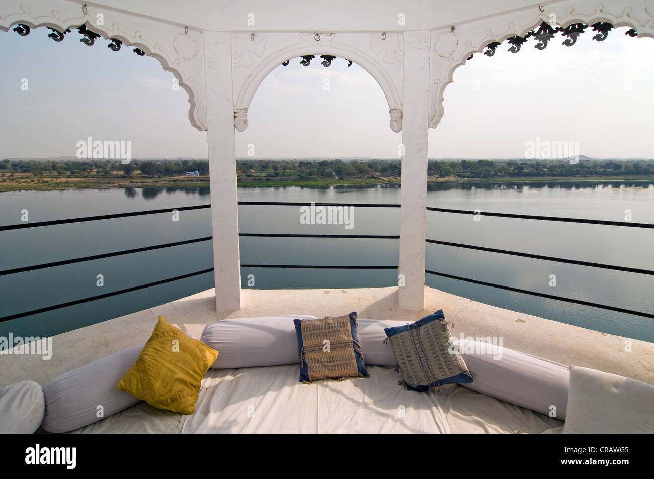 Balcony of a suite overlooking the Narmada river, Heritage Hotel Ahilya Fort, Maheshwar, Madhya Pradesh, India, Asia Stock Photo
