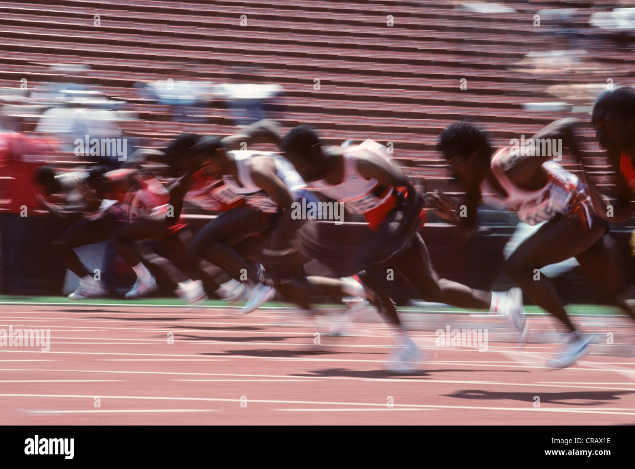 Blurred action of the start of 100 meter race at the 1984 US Olympic