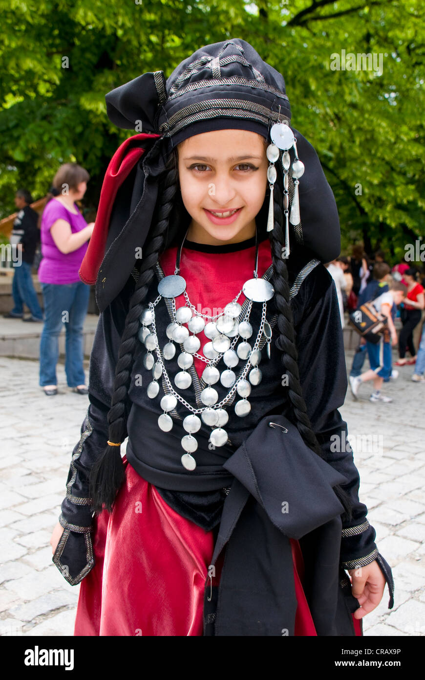 Girl wearing a costume, dancing, Sighnaghi, Kakheti province, Georgia, Caucasus region, Middle East Stock Photo