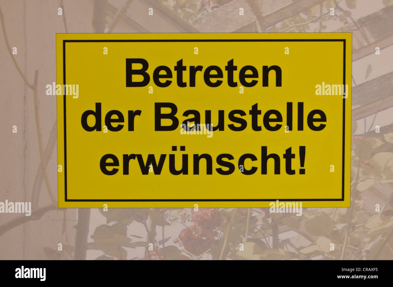 Sign, Betreten der Baustelle erwuenscht!, German for entering the construction site is encouraged Stock Photo