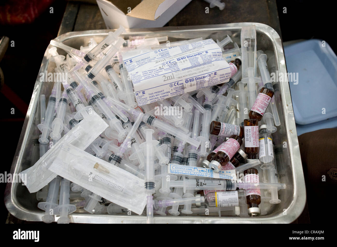 Disposable syringes and serum, vaccination campaign for children by the German Doctors for Developing Countries in Calcutta, Stock Photo