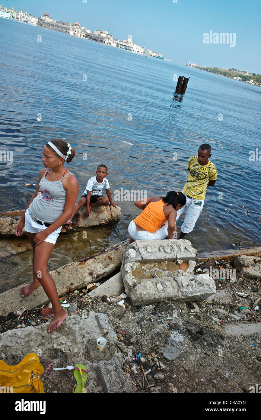 Family practising African Cuban Santeria on a Sunday morning at Regla Stock Photo