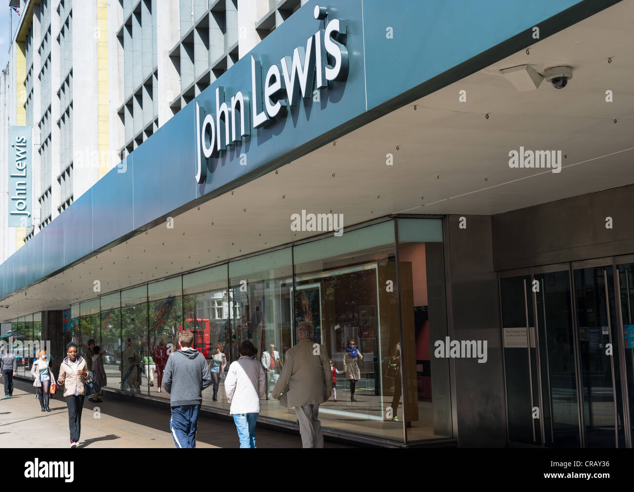 Shoppers outside the john lewis store on oxford street hires stock