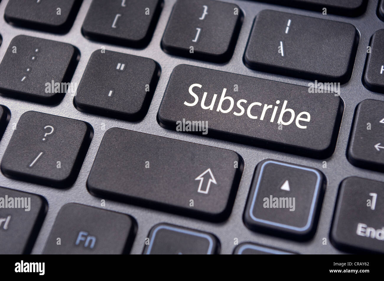 a subscribe message on keyboard enter key, for conceptual usage. Stock Photo
