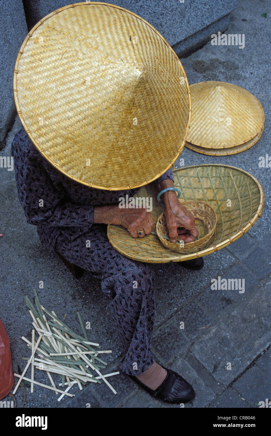 Woman weaving a hat, Hong Kong, China, Asia Stock Photo Alamy