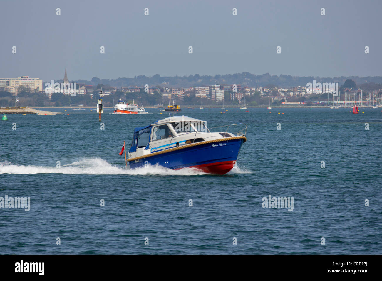 Speedboat travels fast near weymouth Stock Photo