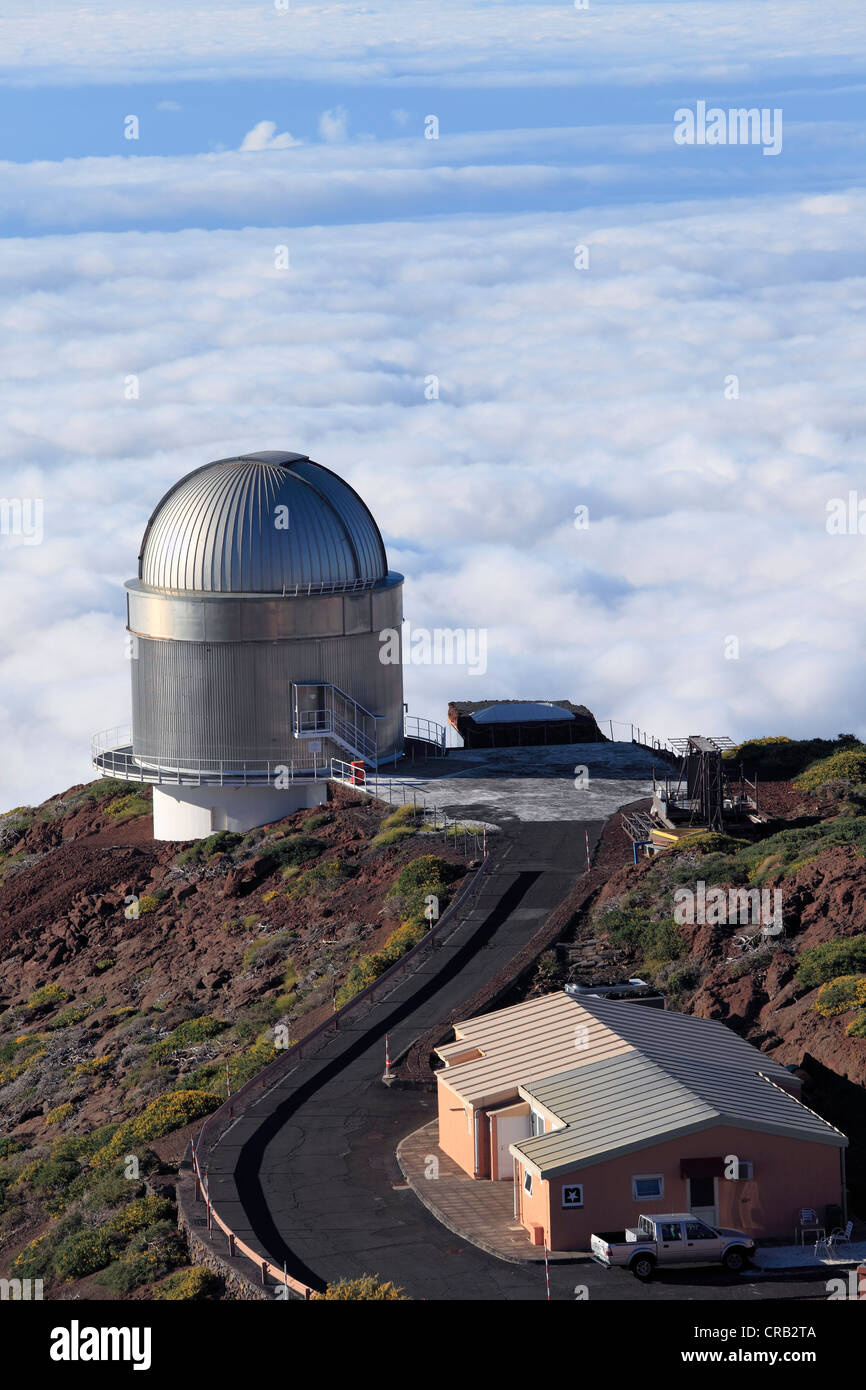 View over the cloud cover with Nordic Optical Telescope observatory, astronomical telescope, Roque de los Muchachos Observatory Stock Photo